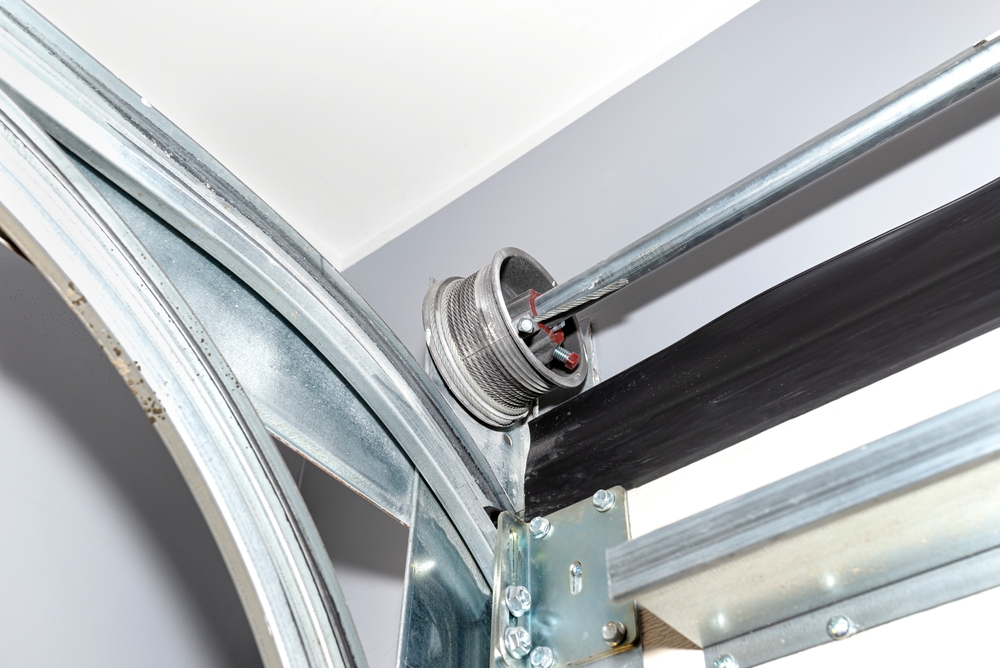 Guides,For,The,Home,Garage,Door,,Visible,Cable,Drum,With