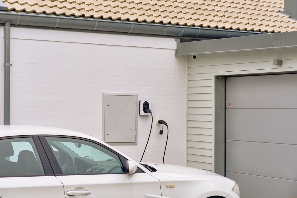 Tygelsjö,,Sweden,;,August,4,,2025:,White,Electric,Car,And